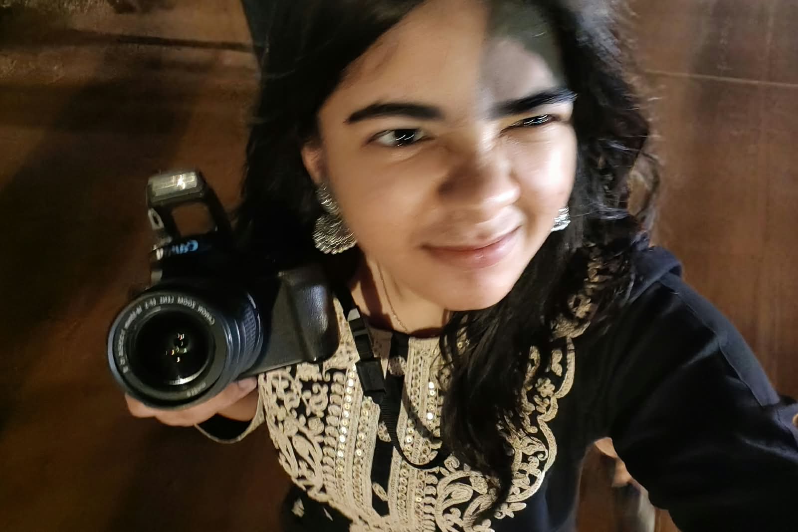 Aadrika holding a camera